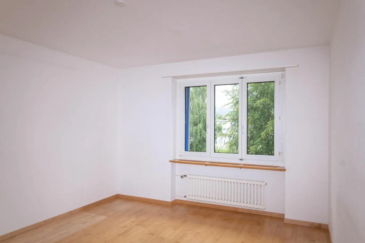 Appartement bien entretenu dans un quartier calme incluant 1 place de parking - Photo 7 sur 10