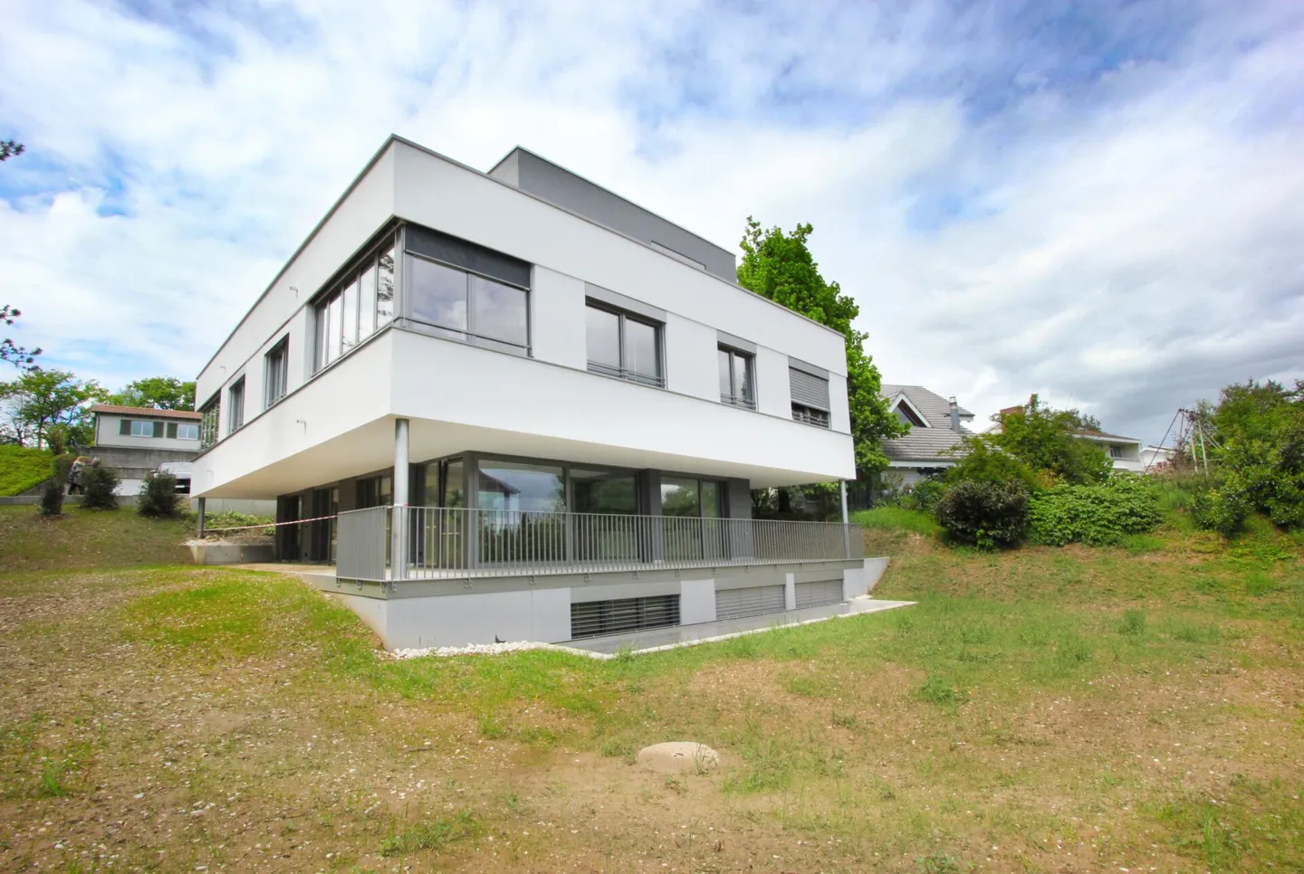 Modern Penthouse Apartment Above the Rooftops of Oberwil - Photo 1 of 7