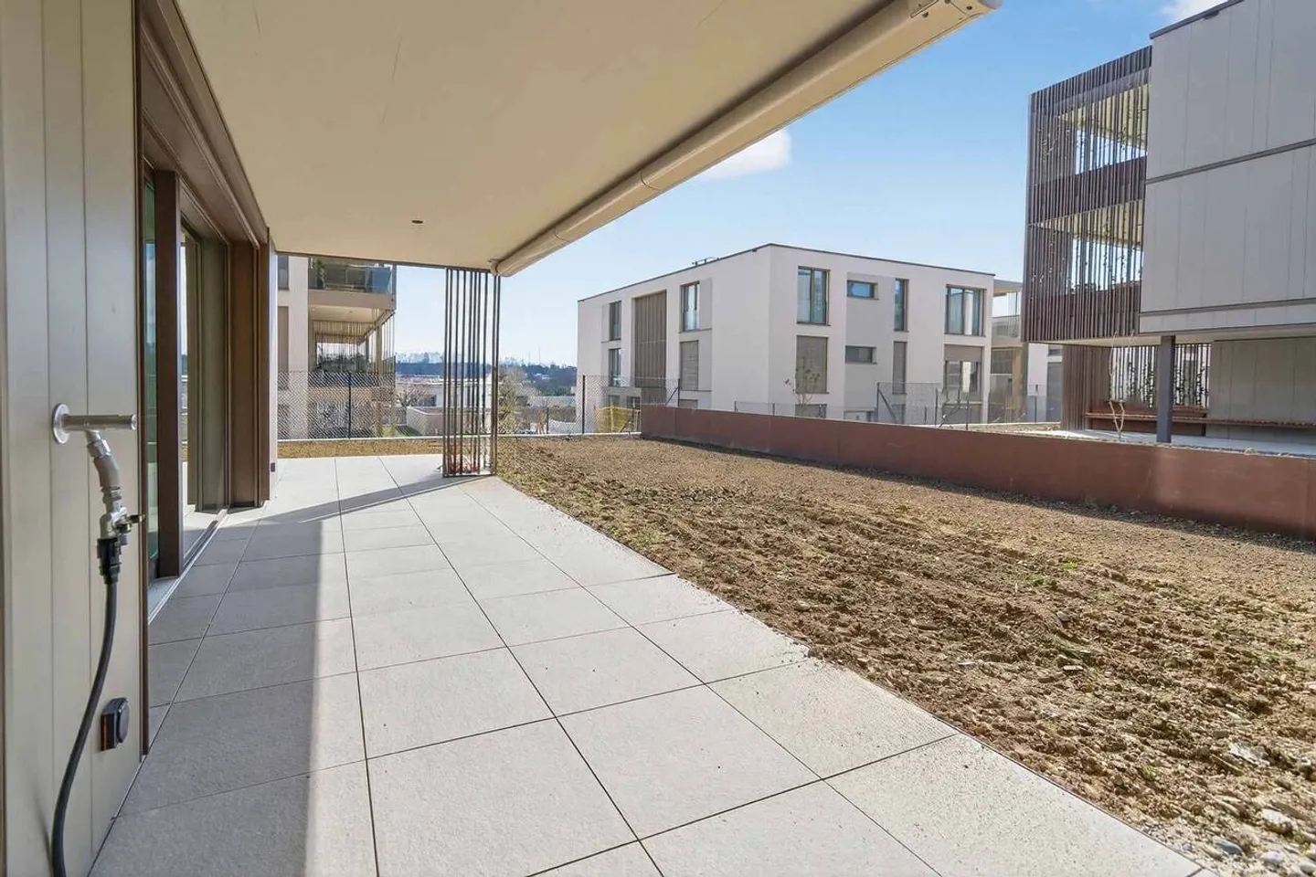 2,5 stanze nuove, spaziose, luminose con giardino - Foto 1 di 9