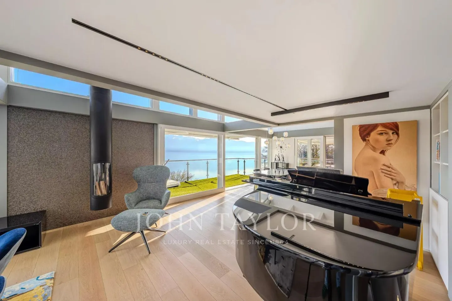 ESCLUSIVITÀ: Villa contemporanea con vista panoramica sul lago e sulle Alpi - Foto 5 di 13