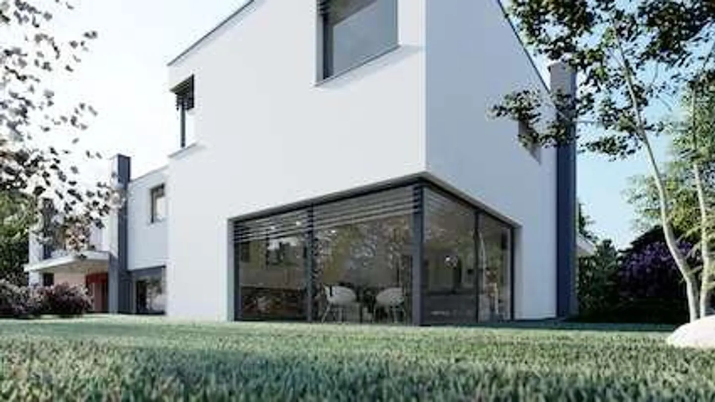 Moderna casa con giardino - Foto 1 di 13