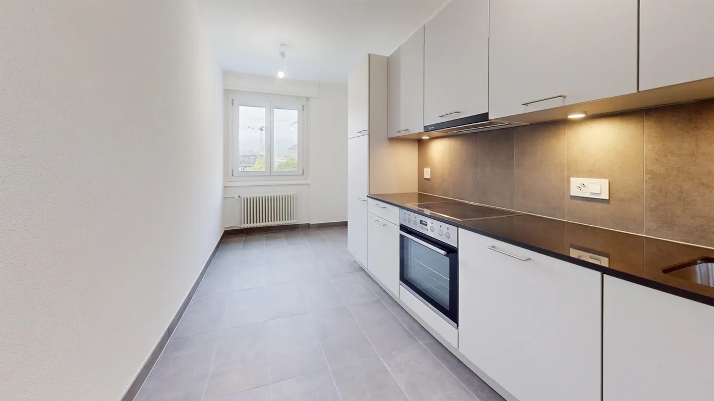 Living in Fribourg: Comfort and Practicality in 2.5 Rooms - Photo 4 of 5