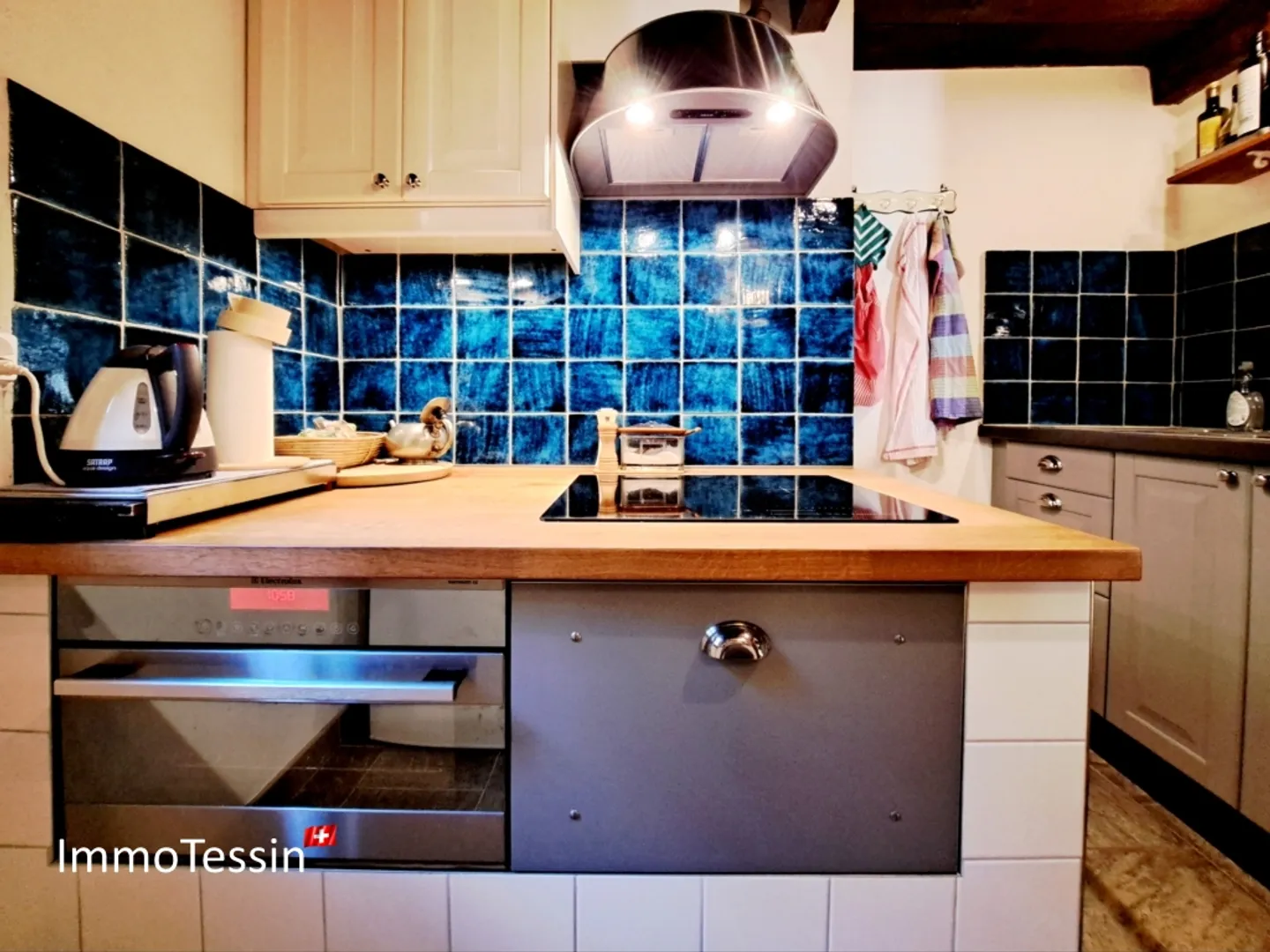 A Jewel in Brissago: The Historic Mill of Brissago Completely Converted into a Residential House - Photo 9 of 13