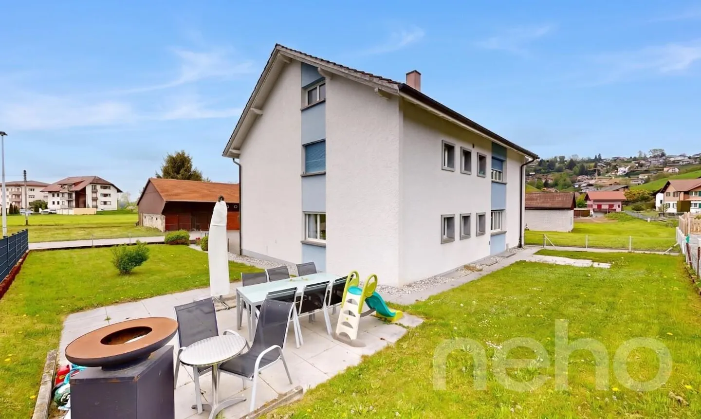 Maison multifamiliale dans le vert Plasselb - Photo 1 sur 11