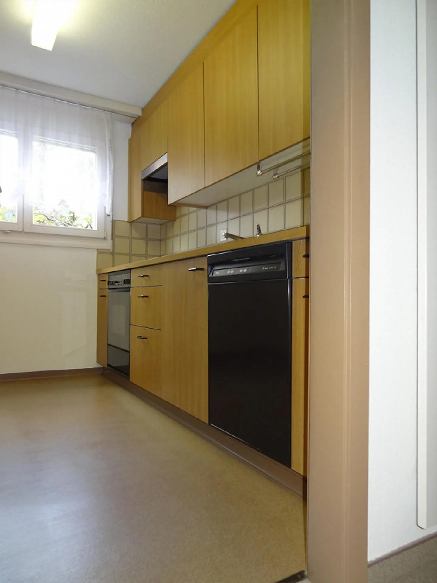 Una strada di quartiere tranquilla - Foto 5 di 13