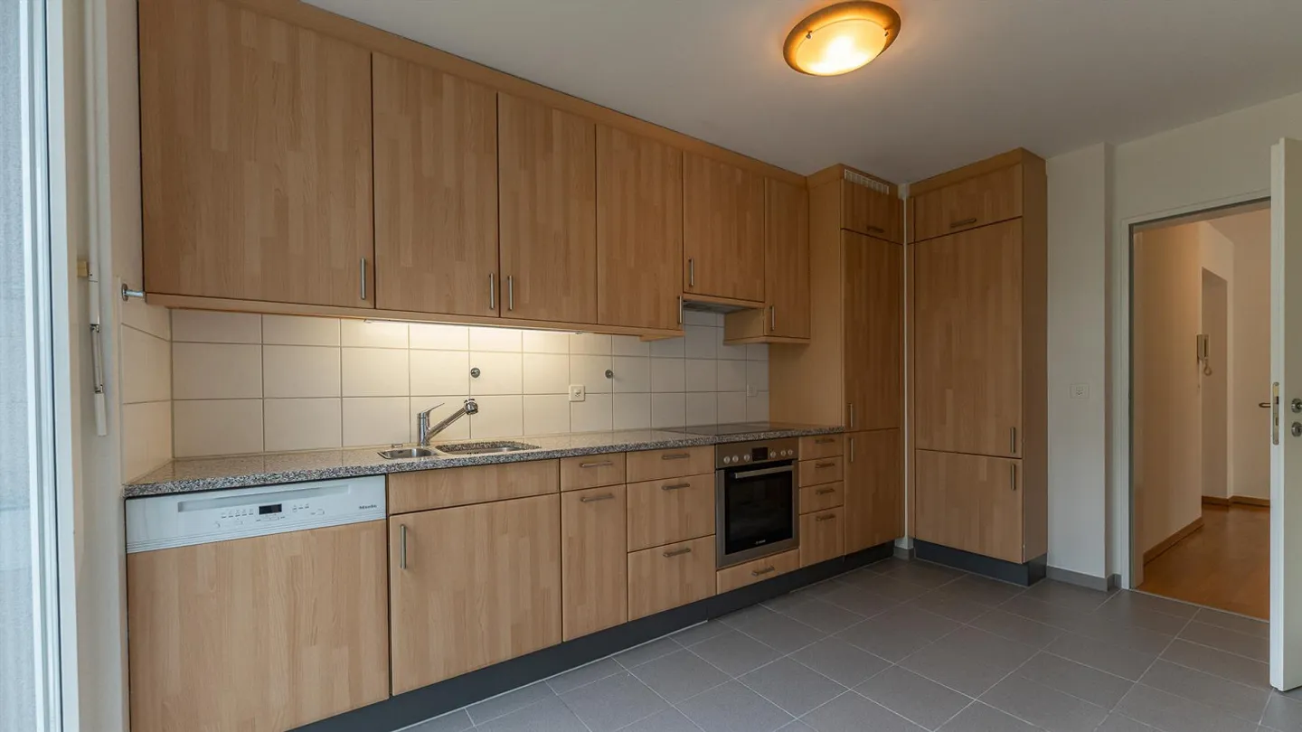 Appartamento giardino 3,5 locali in posizione tranquilla - Foto 3 di 11