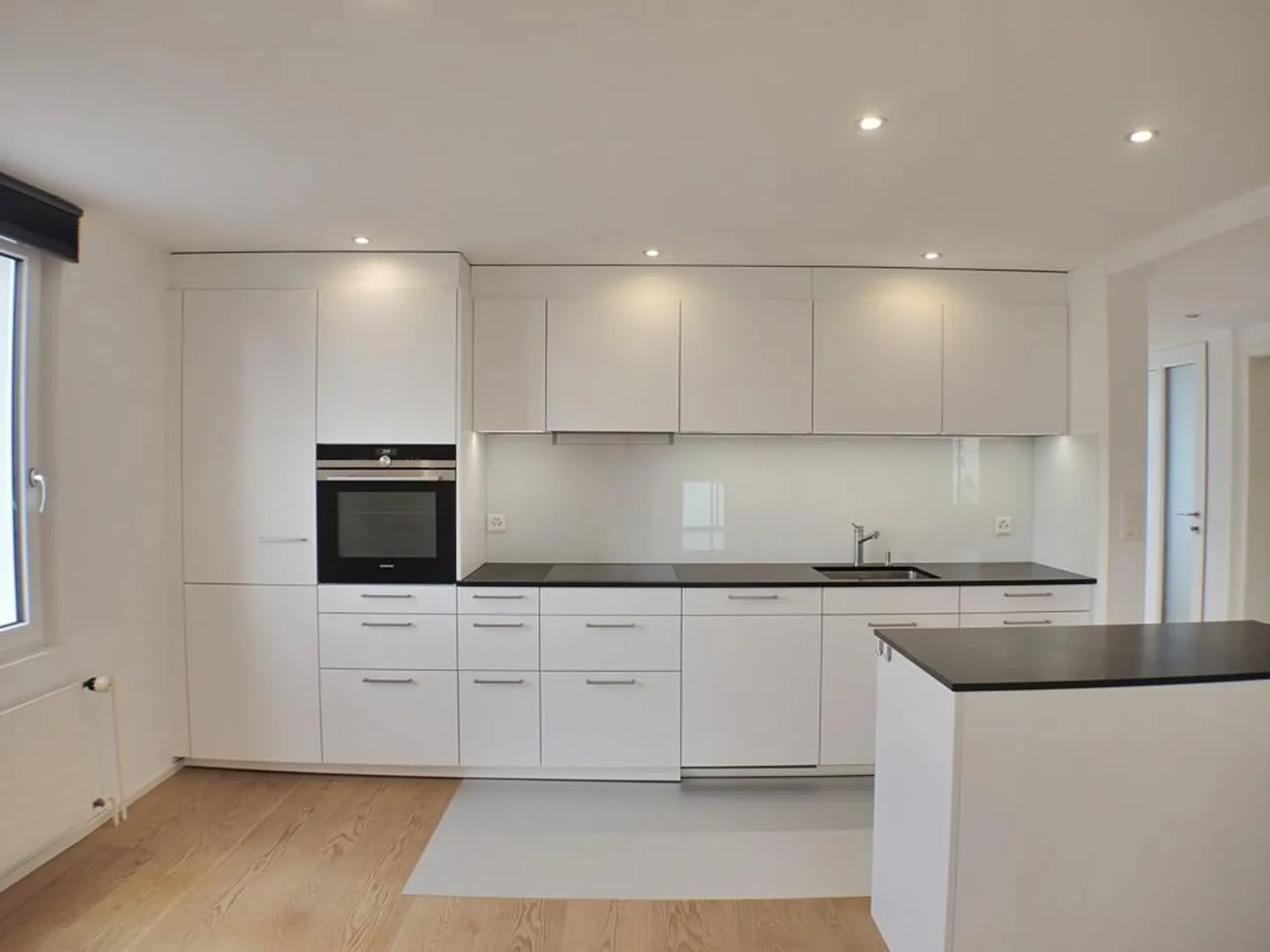 Moderne Dachwohnung mit Seeblick - Foto 1 von 9
