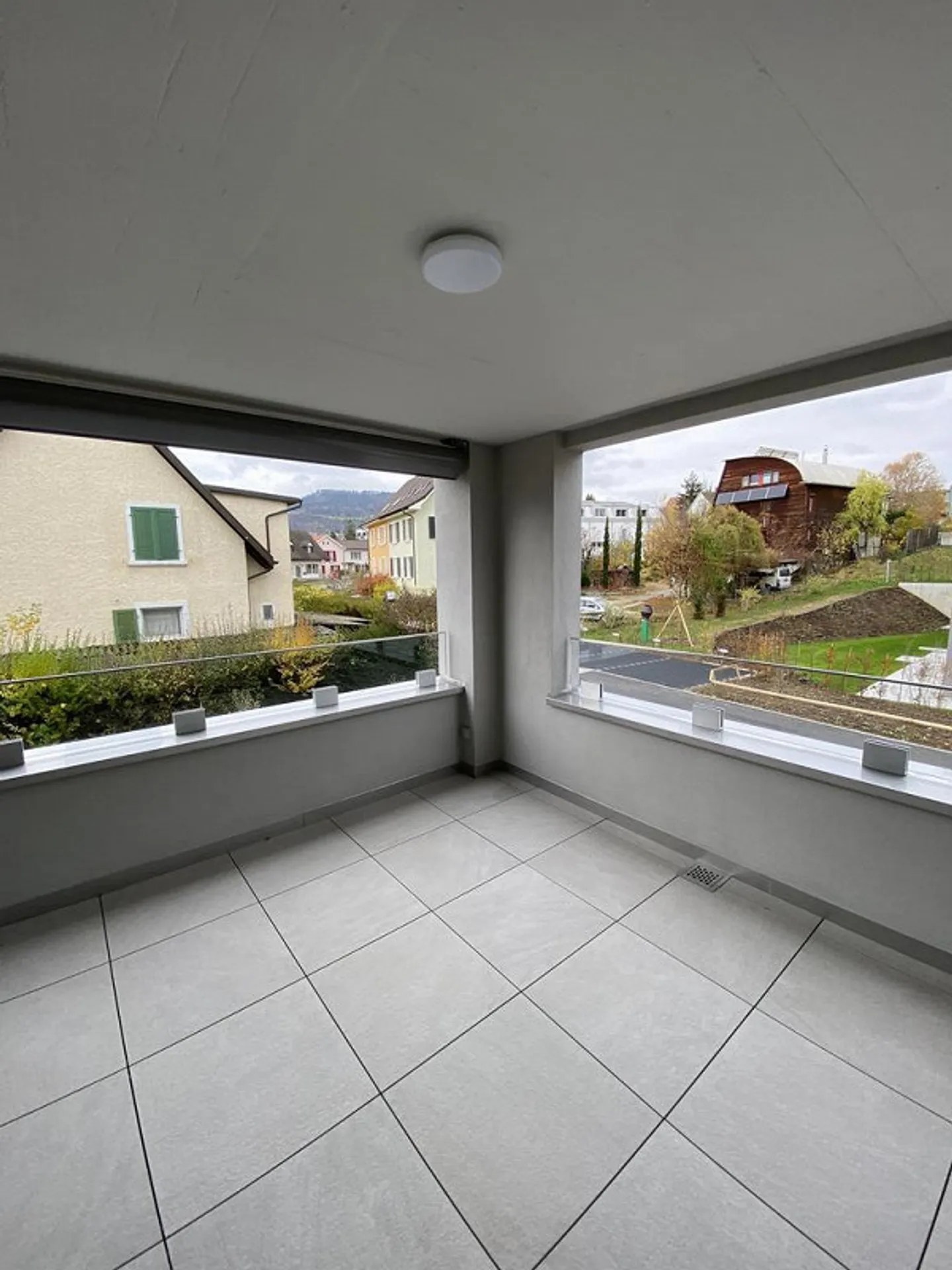 Neubau Wohnung in mitten von Aesch - Foto 2 von 9