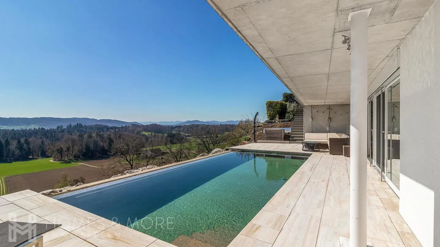Casa di design esclusiva con piscina a sfioro e vista panoramica - Foto 8 di 8