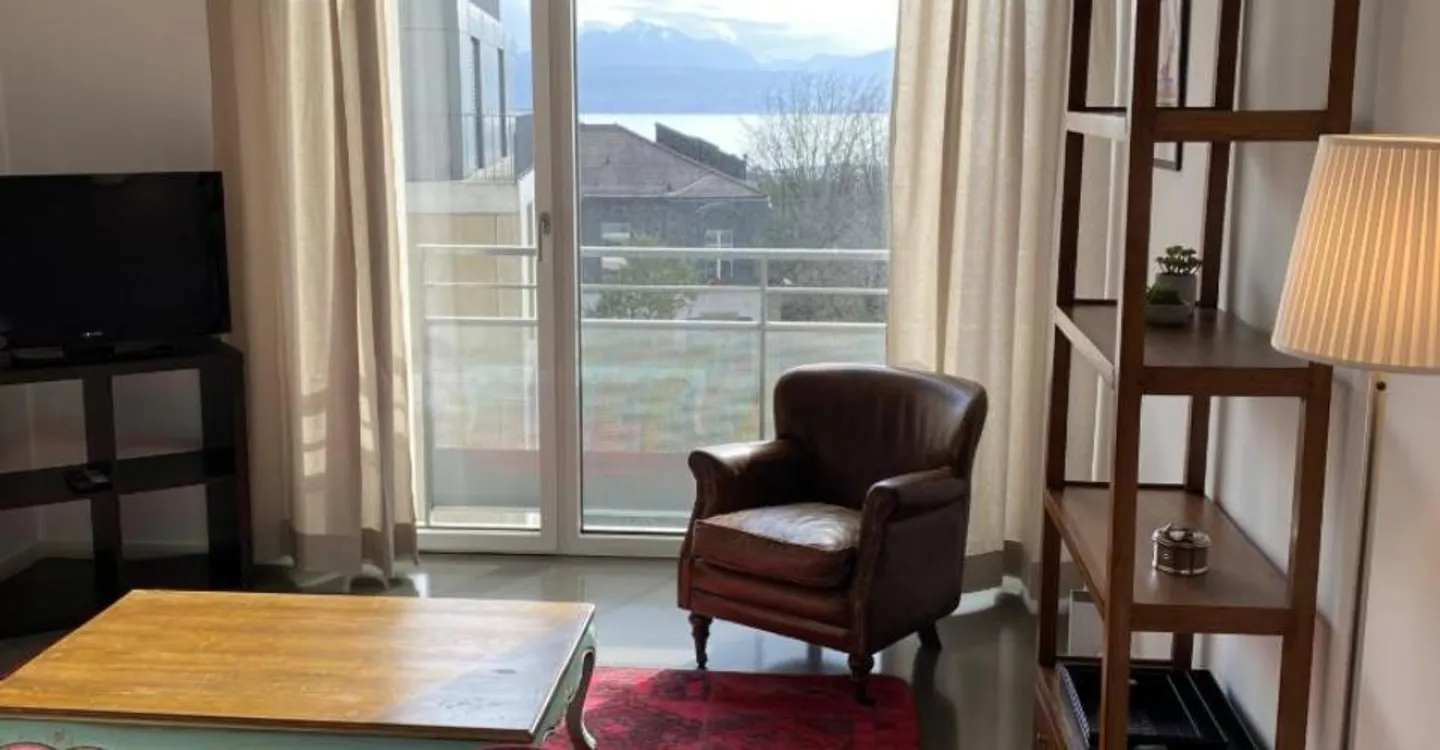 Appartement Duplex avec Vue Lac - Photo 2 sur 10