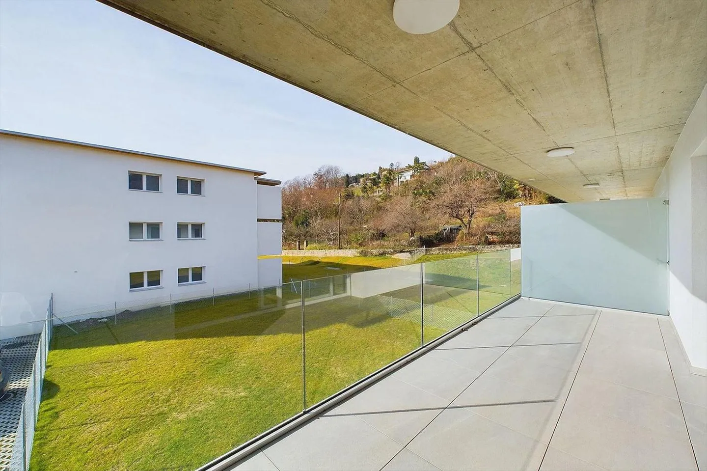 Caslano VN 119001001-2727 | Modernes 3½ Zimmer Renditewohnung an bester Lage - Foto 1 von 10