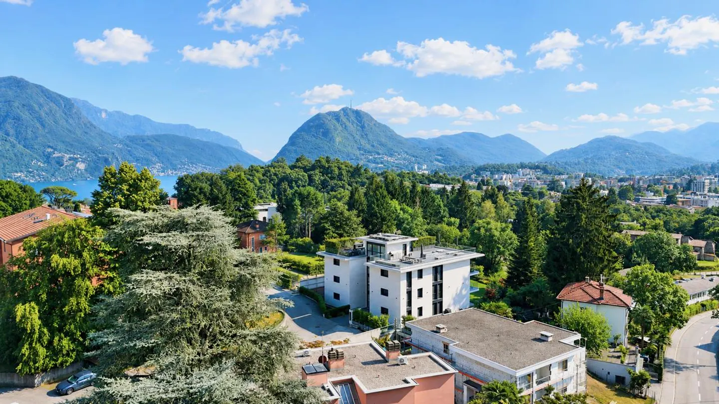Appartement Meublé Élégant avec Vue Panoramique à Porza - Photo 2 sur 16