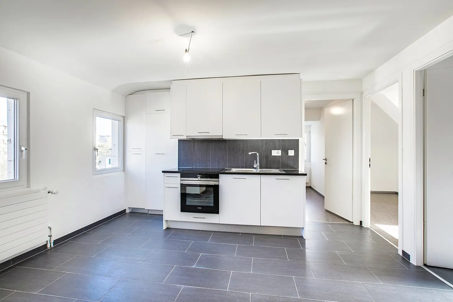 Charmante renovierte 3.5-Zimmer-Wohnung im Dachgeschoss - Foto 2 von 11