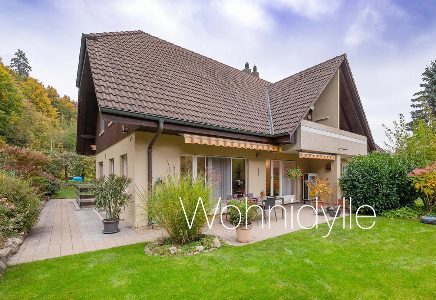 Charmantes Haus mit idyllischem Garten - Foto 1 von 14