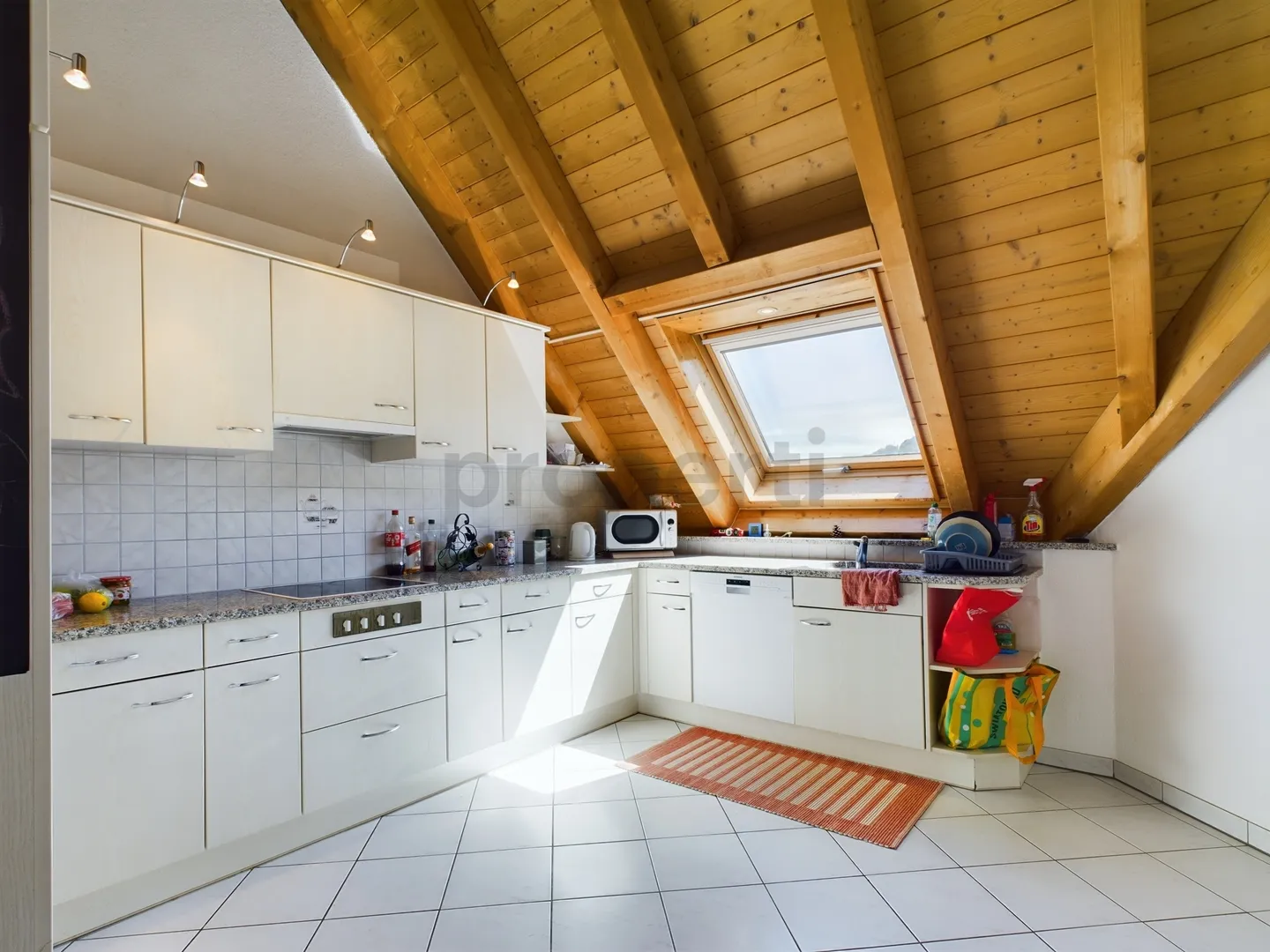 Charmante Dachwohnung - Foto 4 von 11