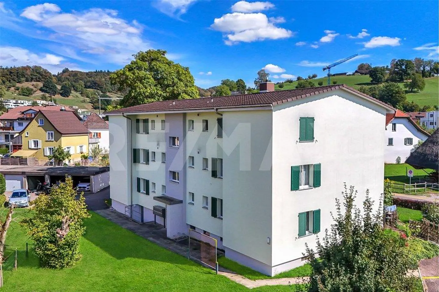 Casa multifamiliare ben tenuta con tre appartamenti di 2½ e sei appartamenti di 3½ stanze - Foto 7 di 10