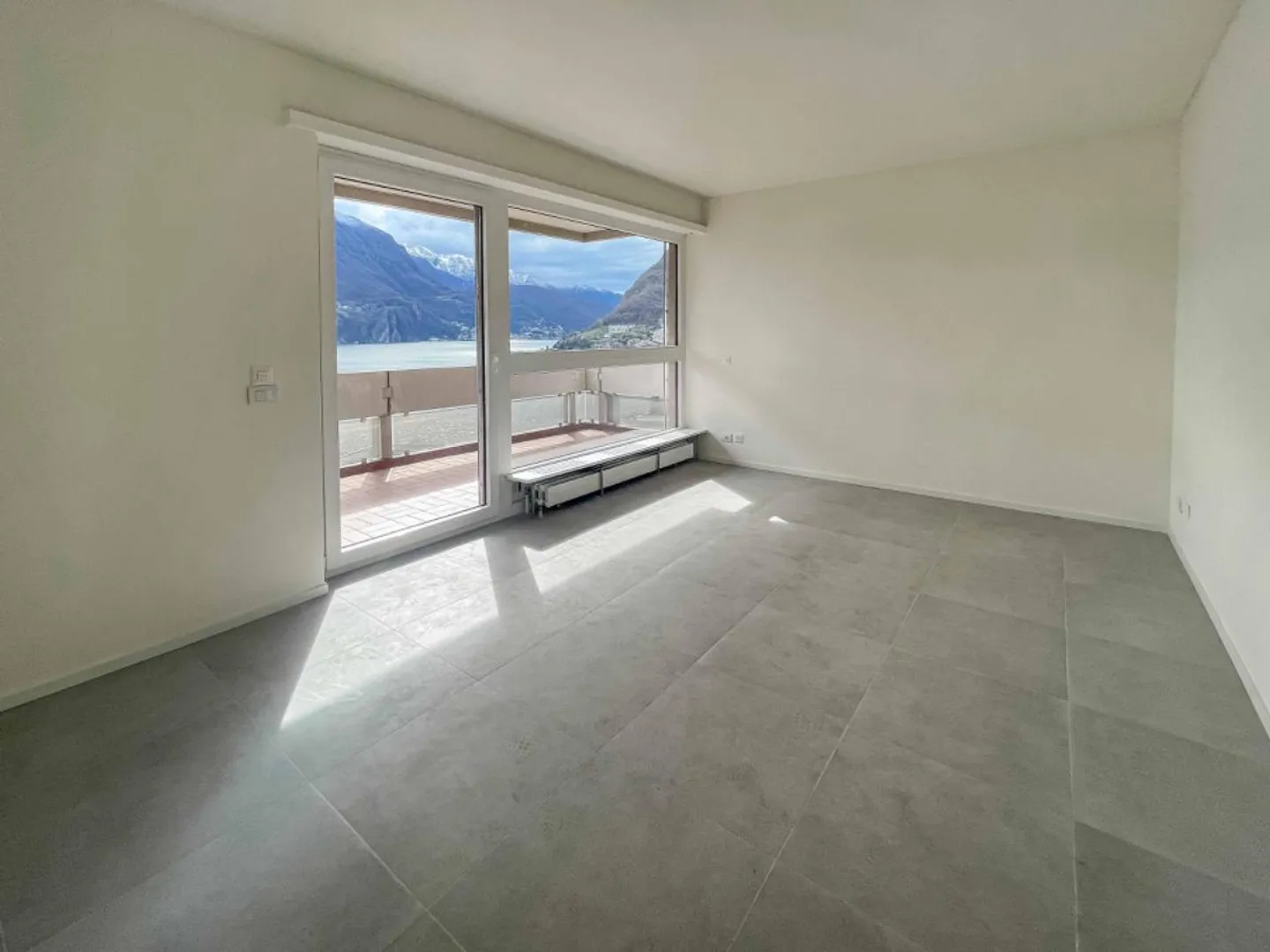 3,5-Zimmer-Wohnung mit herrlicher Aussicht auf den Luganersee - Foto 3 von 6