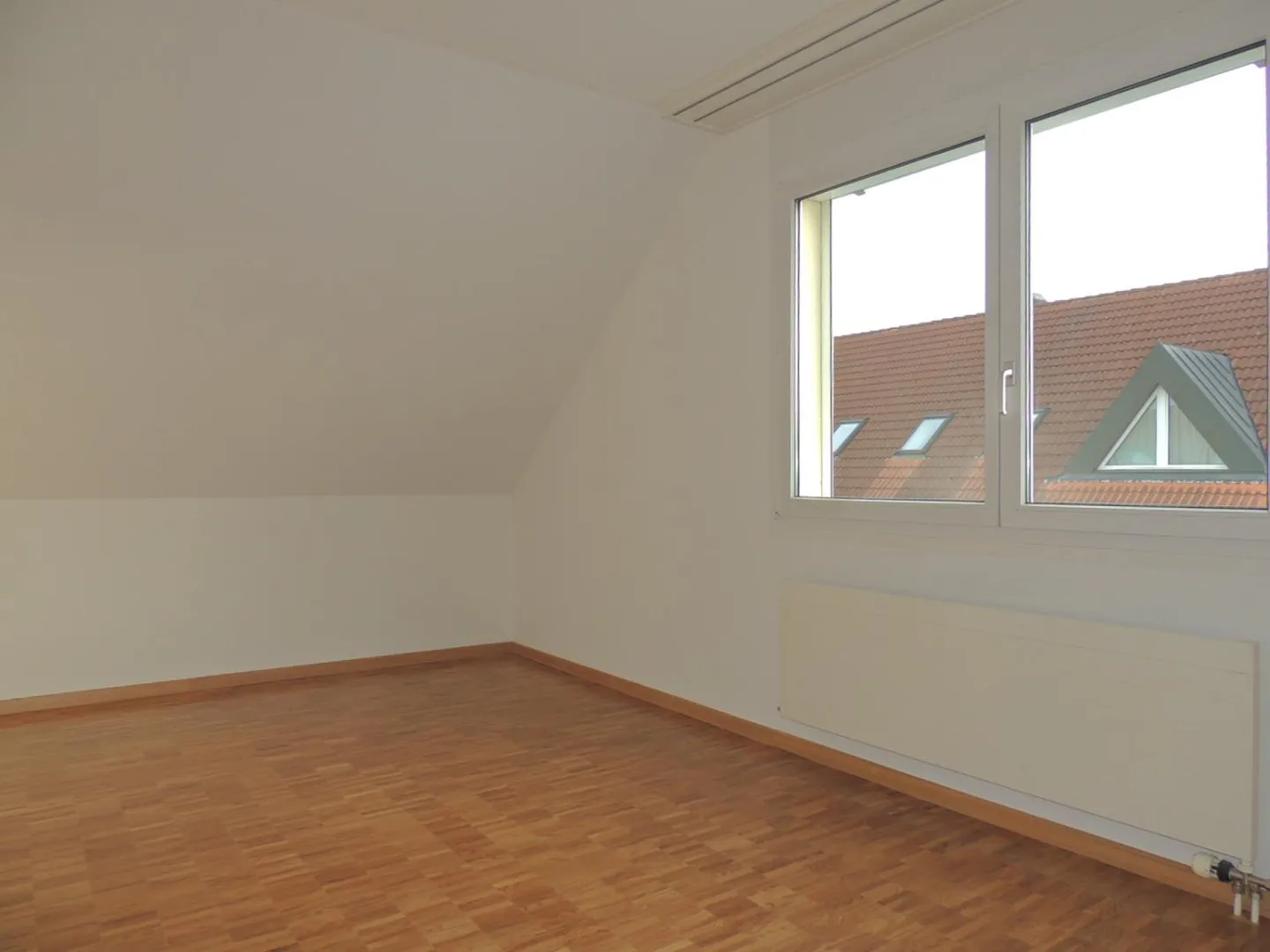 Charmante Dachwohnung - Foto 8 von 10