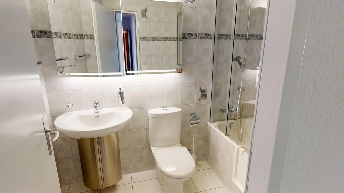 Appartement pratique et bien entretenu de 3,5 pièces avec place de parking - Photo 10 sur 13