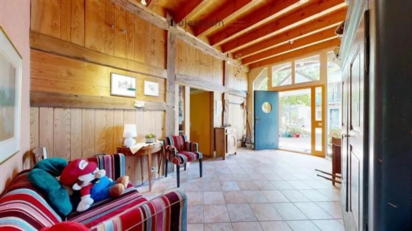 Volume, Character and Potential in a Historical and Renovated Farmhouse - Photo 3 of 20