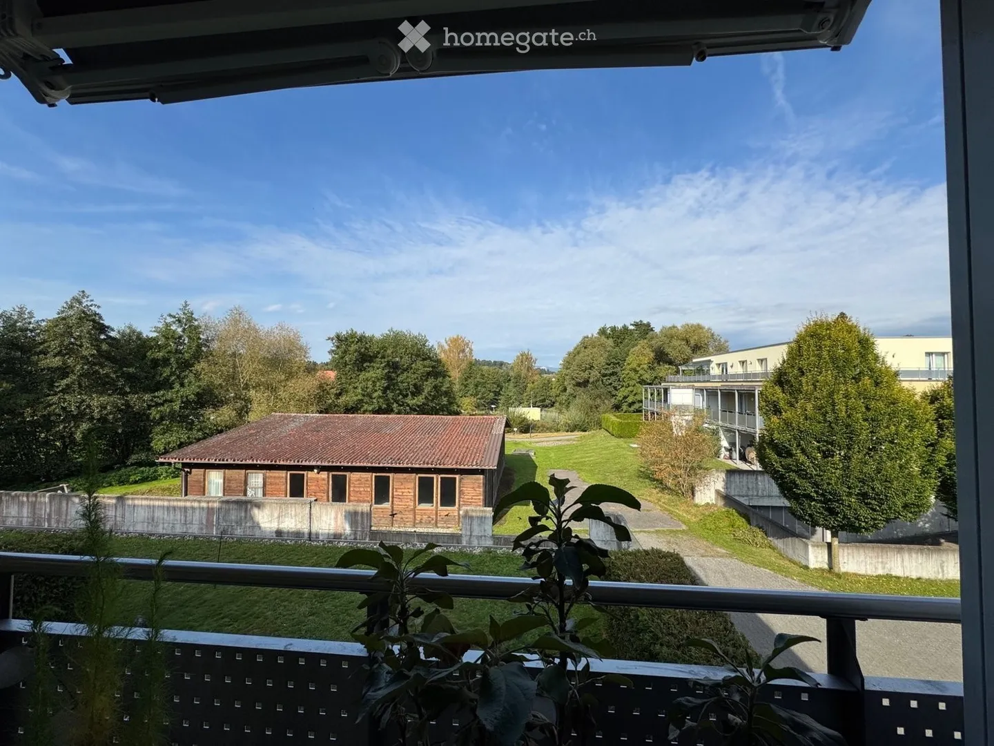 Appartement 4.5 pièces avec 2 places de parking et station de recharge - Photo 2 sur 5