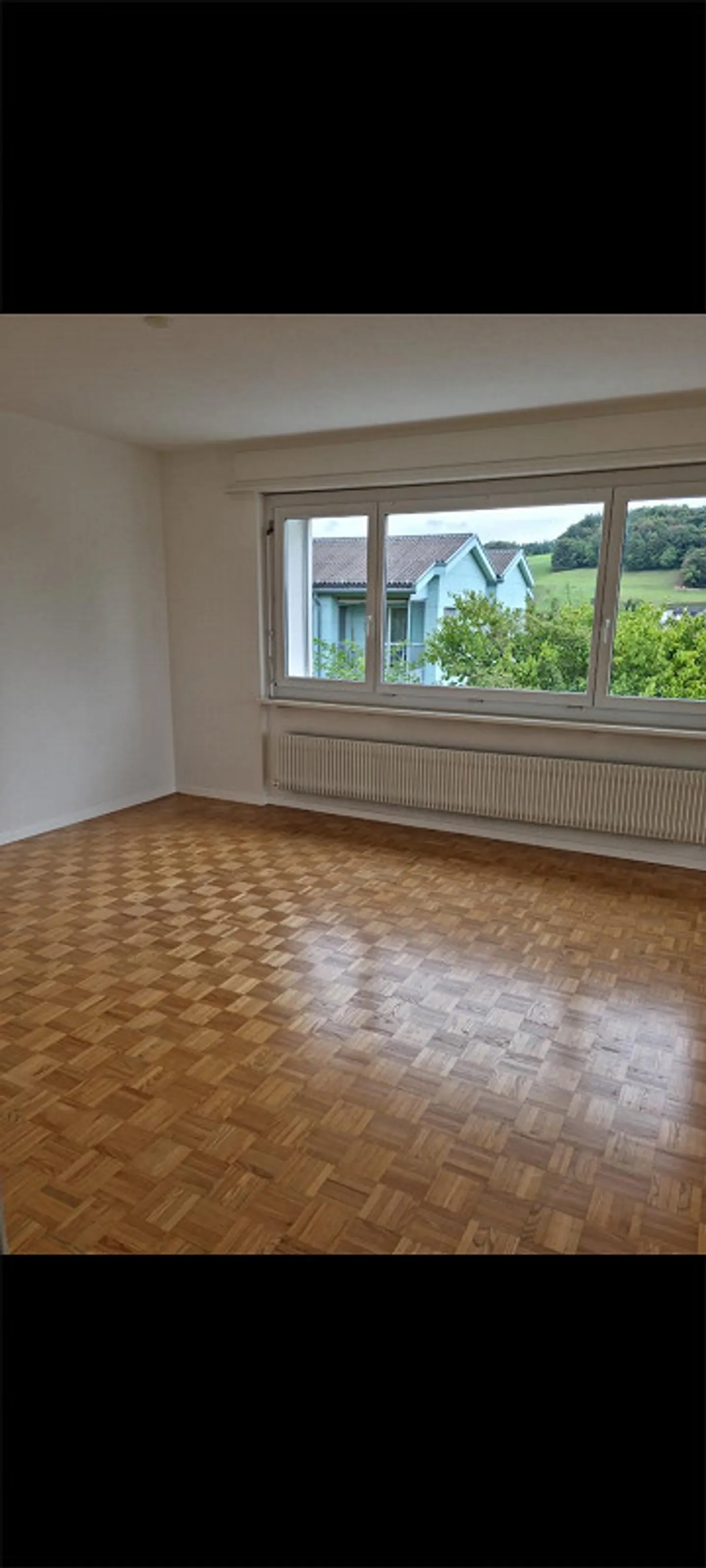 Appartement spacieux et lumineux de 4,5 pièces - Photo 3 sur 11