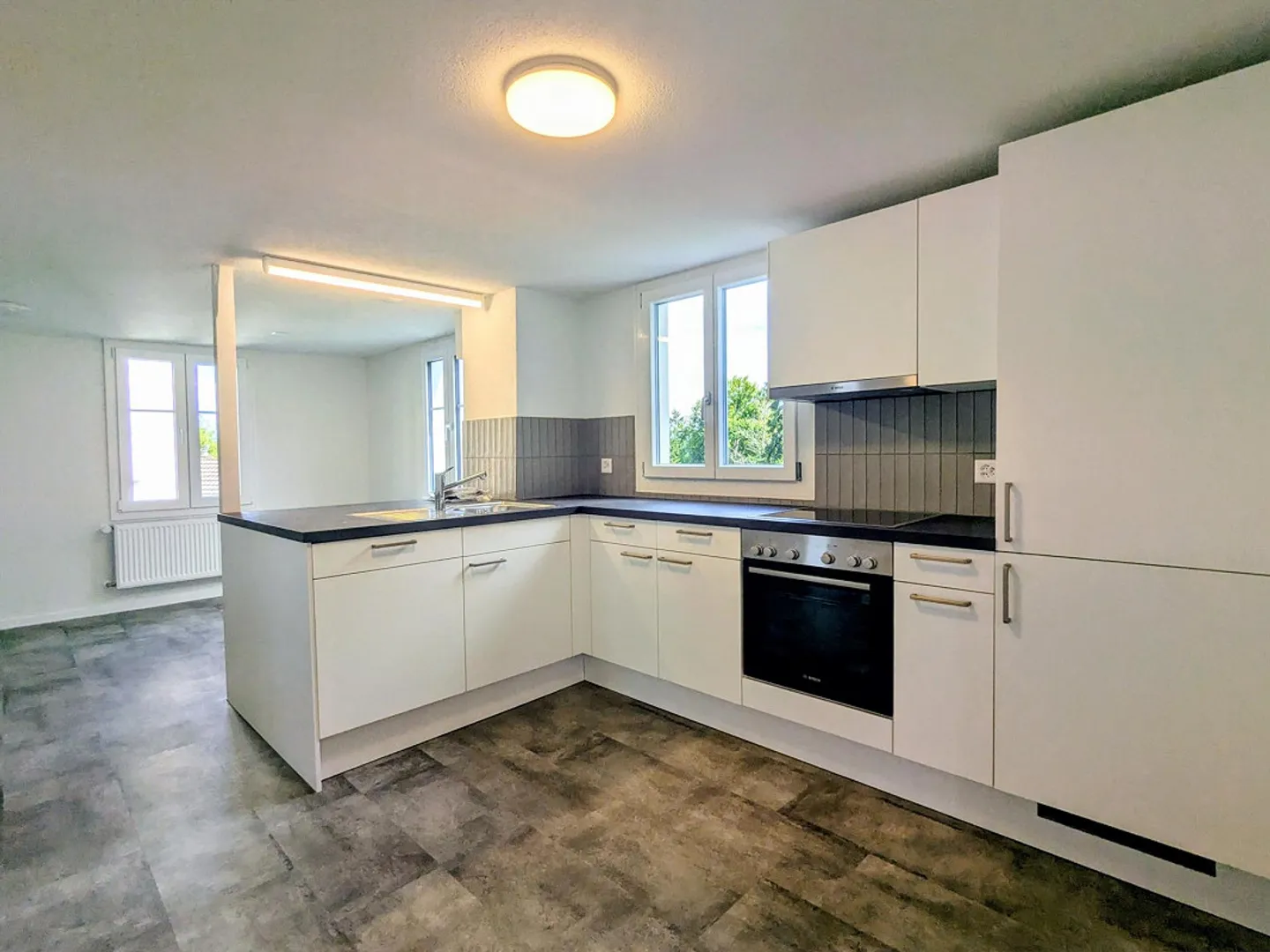 Wunderschöne Wohnung mit Werkstatt - Foto 2 von 6