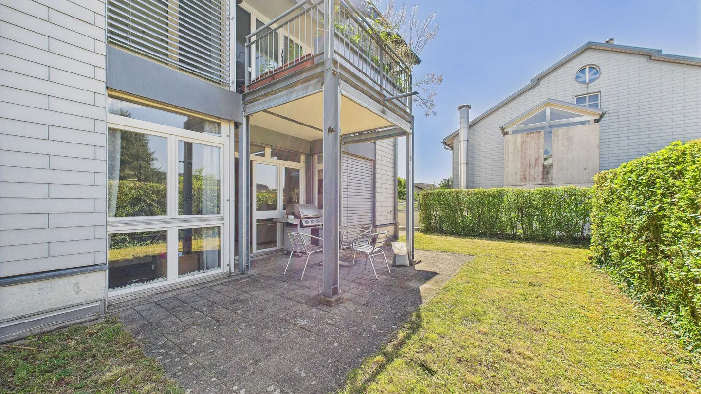 Appartamento con giardino spazioso con layout ben progettato - Foto 1 di 9