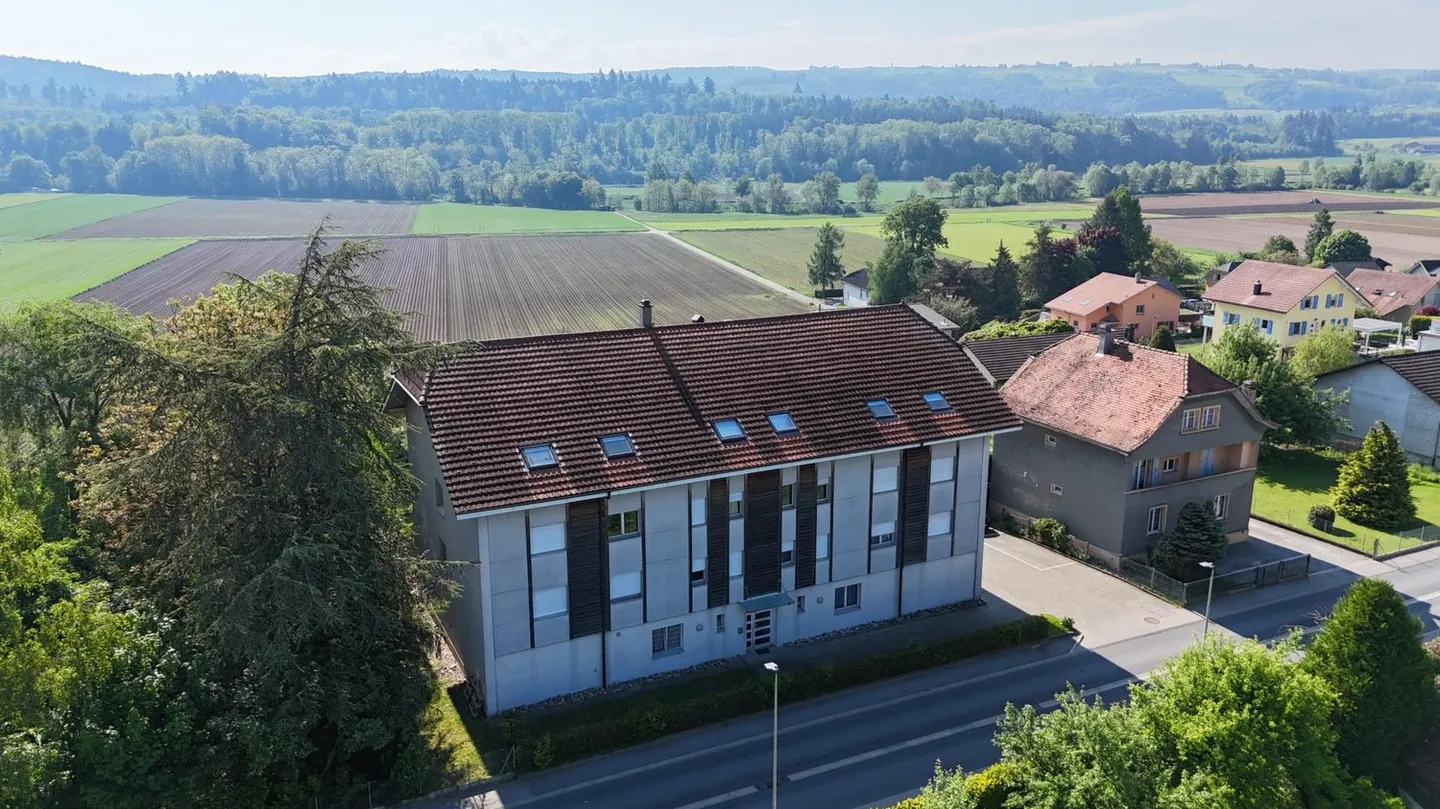 Spacious 2.5-room apartment with unobstructed view in Fétigny - Photo 5 of 7