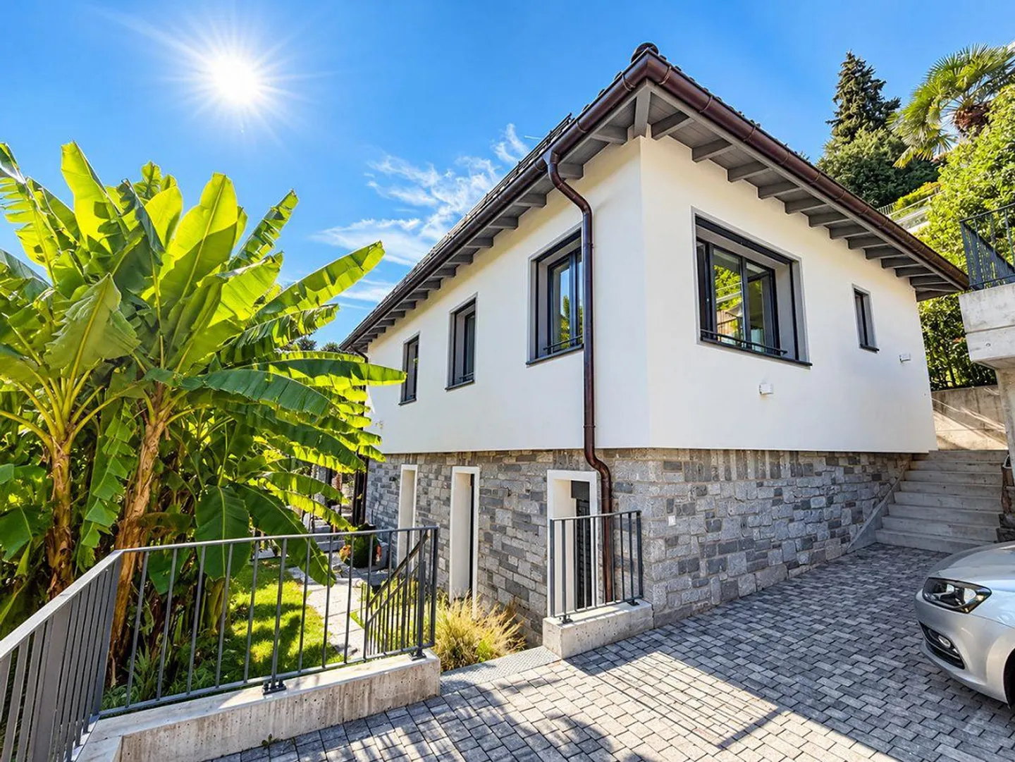 Porza - Elegante 3,5-Zimmer-Wohnung mit Seeblick, Terrasse und... - Foto 1 von 12