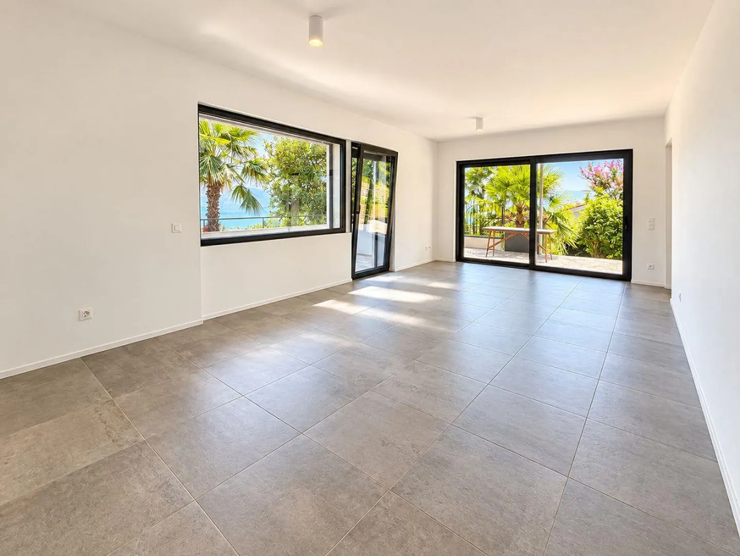 Porza - Elegante 3,5-Zimmer-Wohnung mit Seeblick, Terrasse und... - Foto 2 von 12