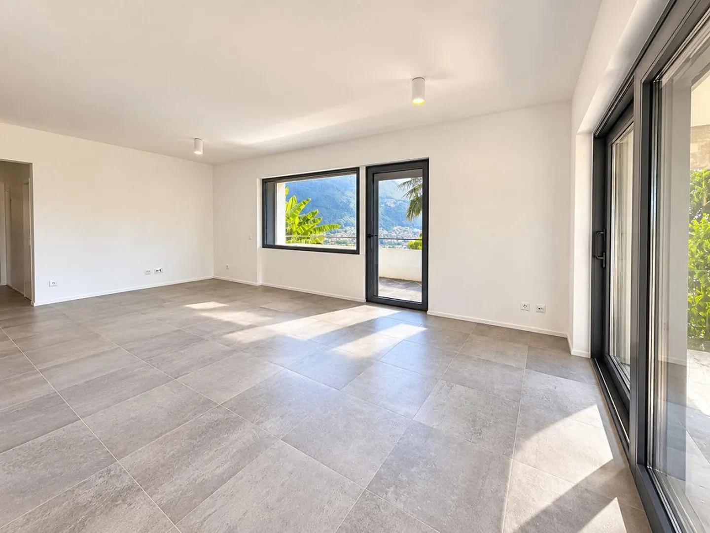 Porza - Elegante 3,5-Zimmer-Wohnung mit Seeblick, Terrasse und... - Foto 6 von 12