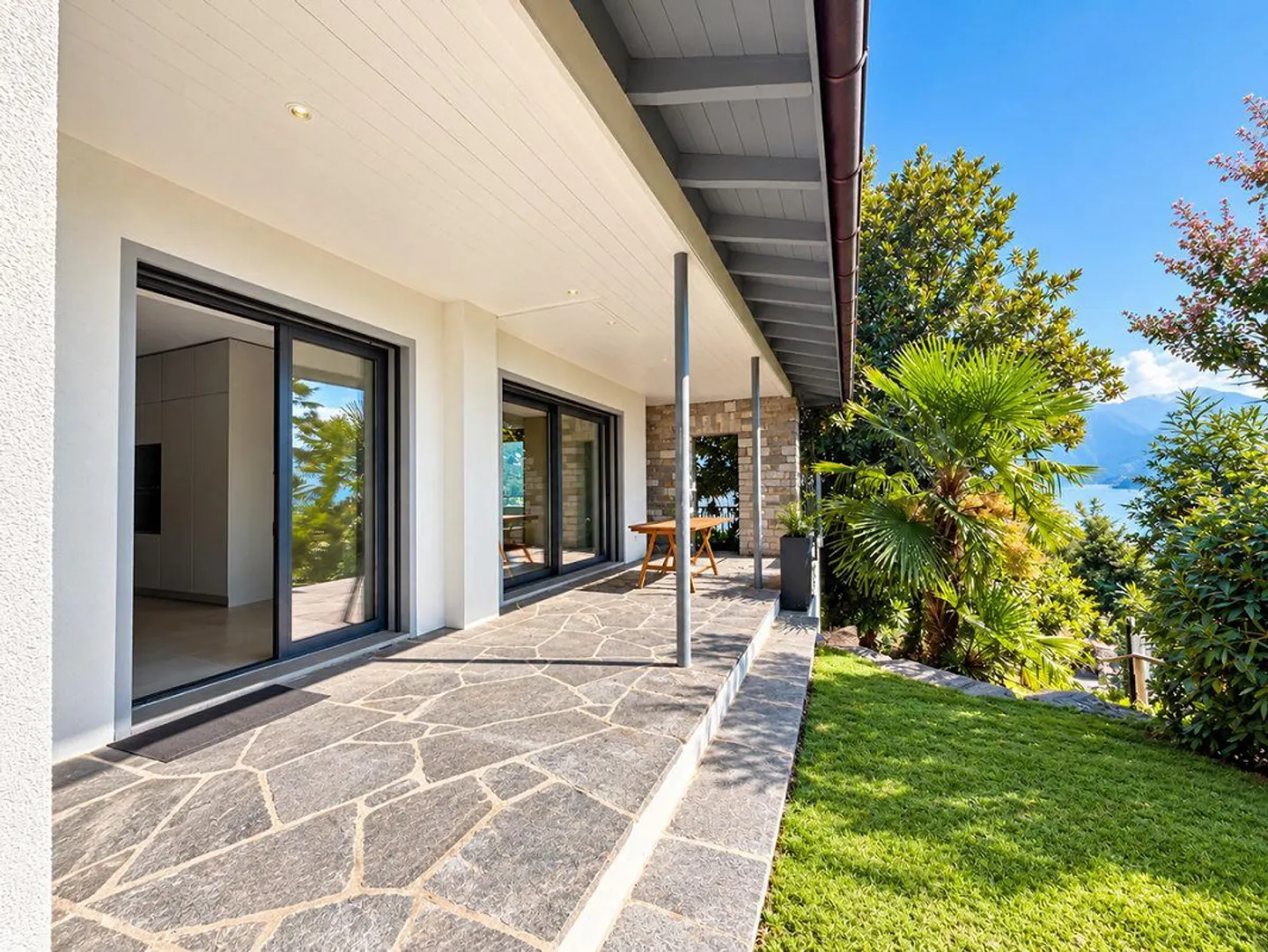 Porza - Elegante 3,5-Zimmer-Wohnung mit Seeblick, Terrasse und... - Foto 11 von 12