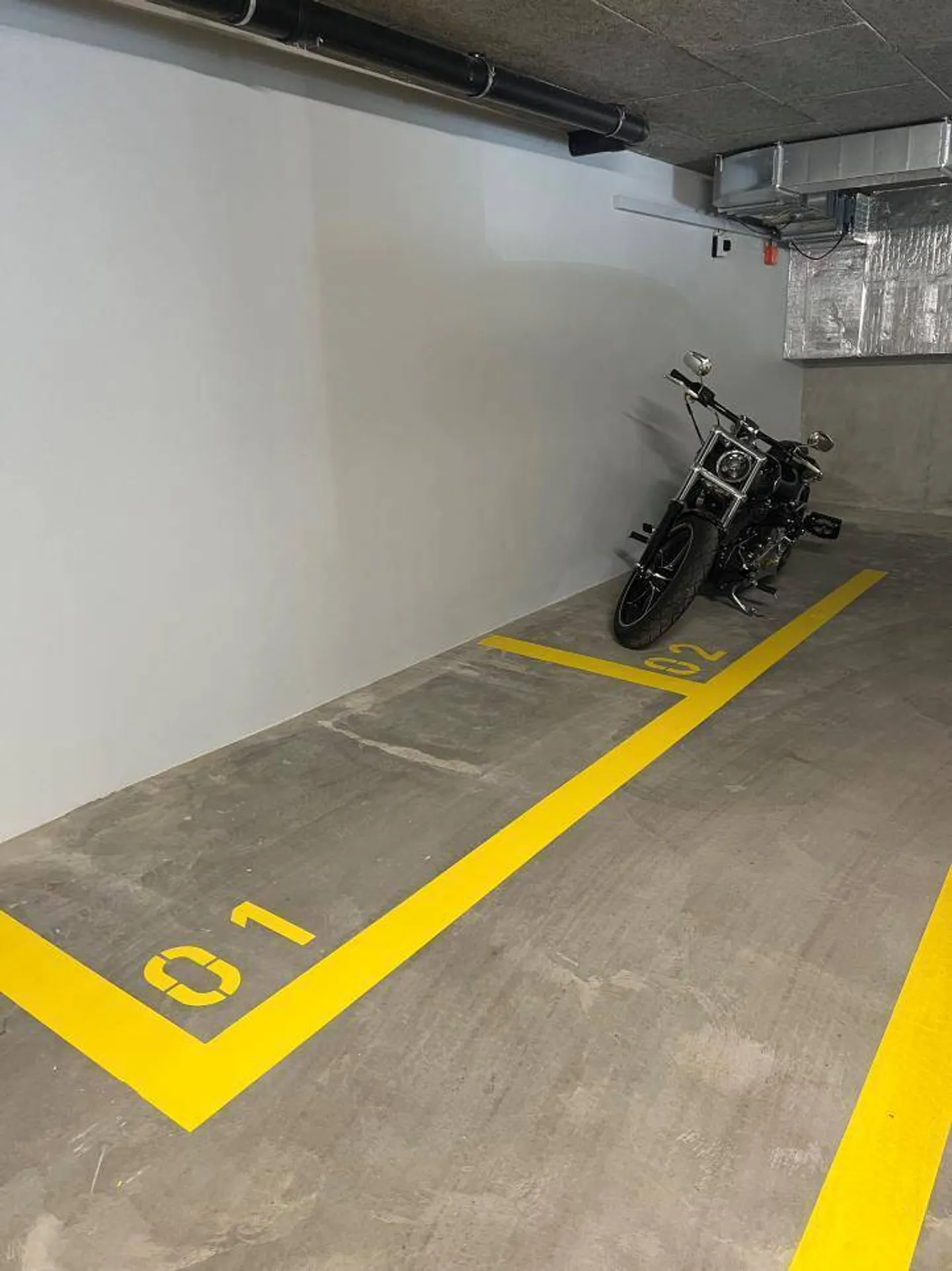 Place souterraine pour moto à Orbe - Photo 2 sur 2