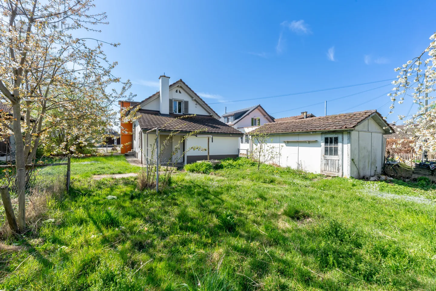 Well-maintained single-family house with garden paradise - Photo 8 of 13