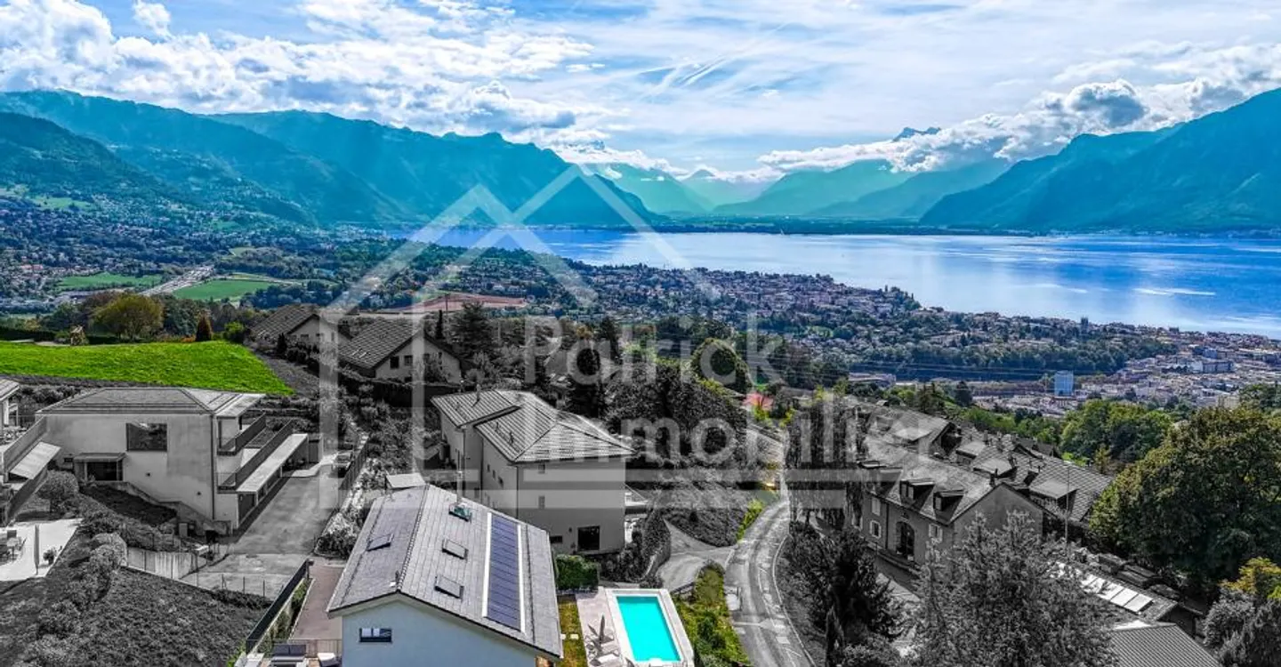Exceptional contemporary property with panoramic lake view - Photo 13 of 13