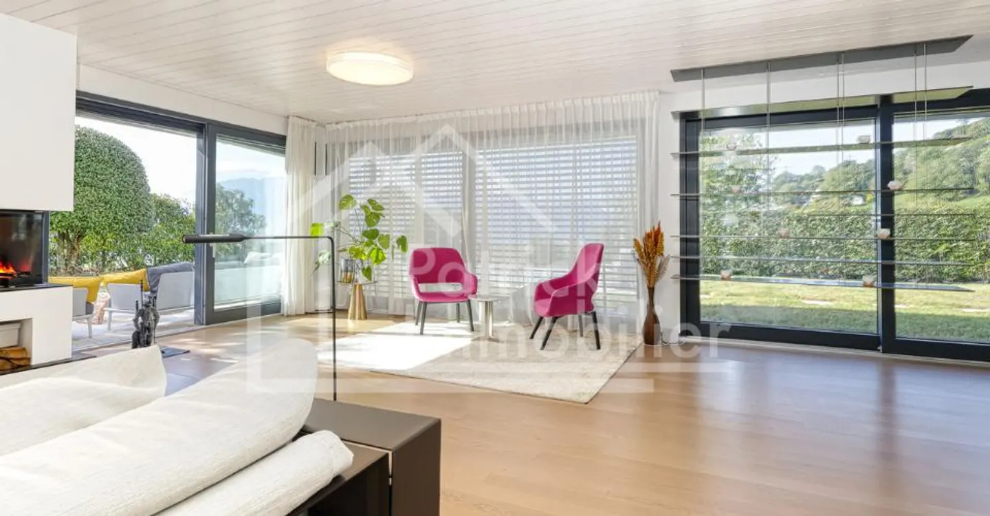 Exceptional contemporary property with panoramic lake view - Photo 2 of 13