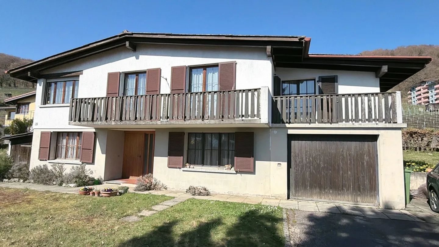 Parzelle mit bestehendem Haus mit hohem Entwicklungspotenzial - Foto 1 von 14