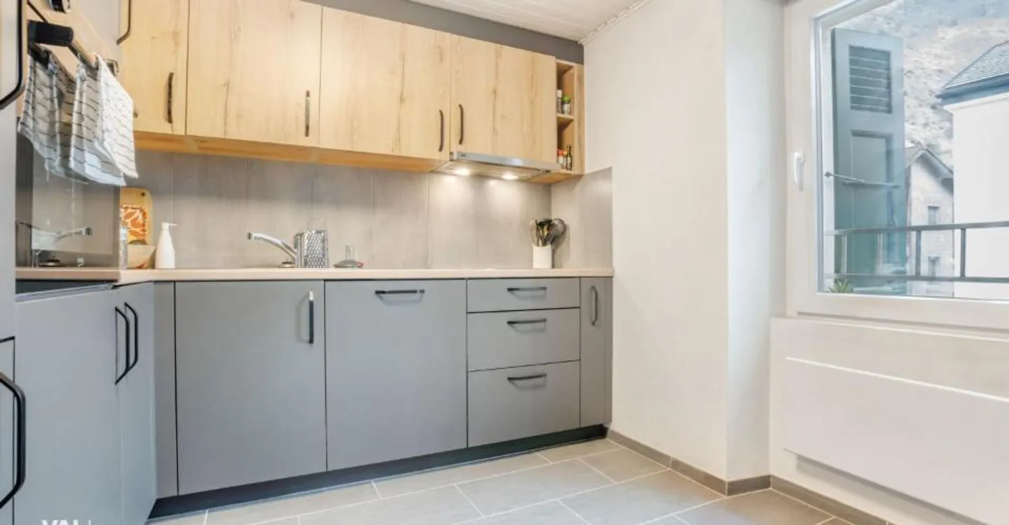 Kleines Gebäude im Herzen des Dorfes mit einer Bruttorendite von 4,5 % - Foto 5 von 12