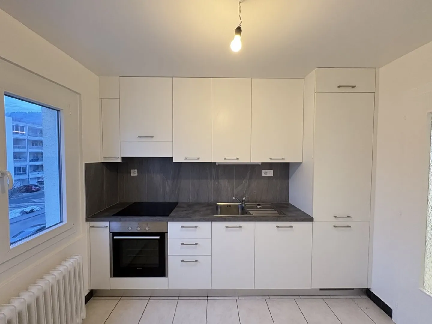 Appartement 3.5 pièces à CHF 1'600.-/mois charges comprises - Photo 2 sur 8