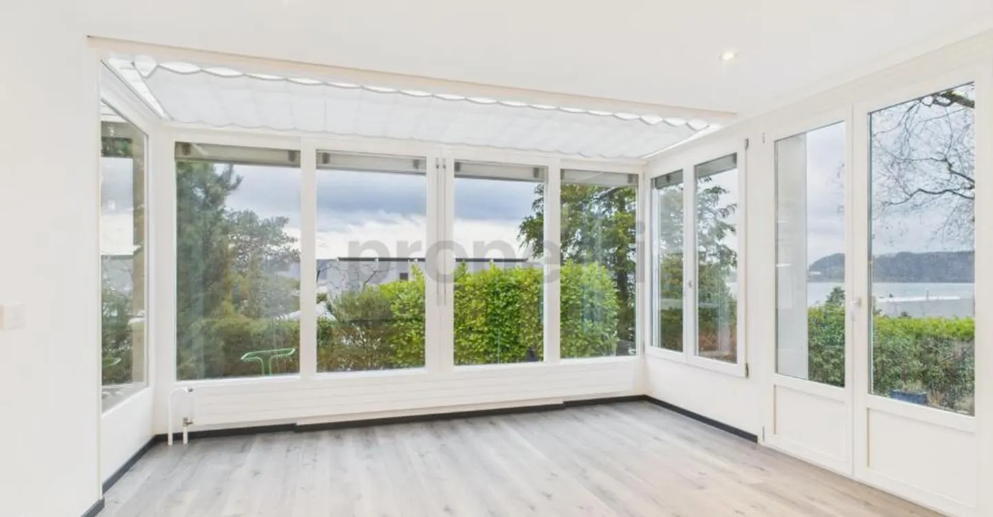 Modern 6.5-room renovated row house with garden in La Neuveville - Photo 1 of 13