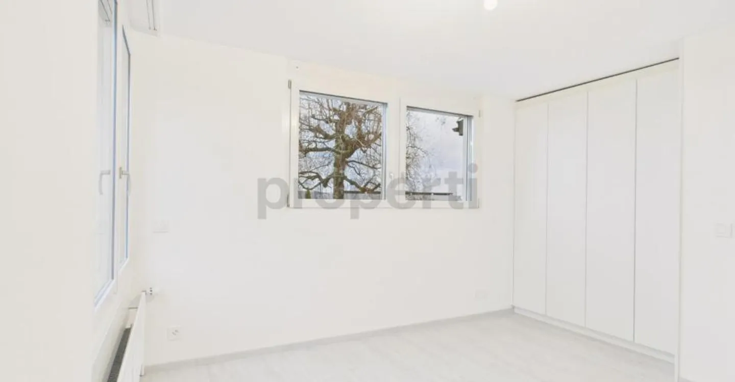 Modern 6.5-room renovated row house with garden in La Neuveville - Photo 5 of 13