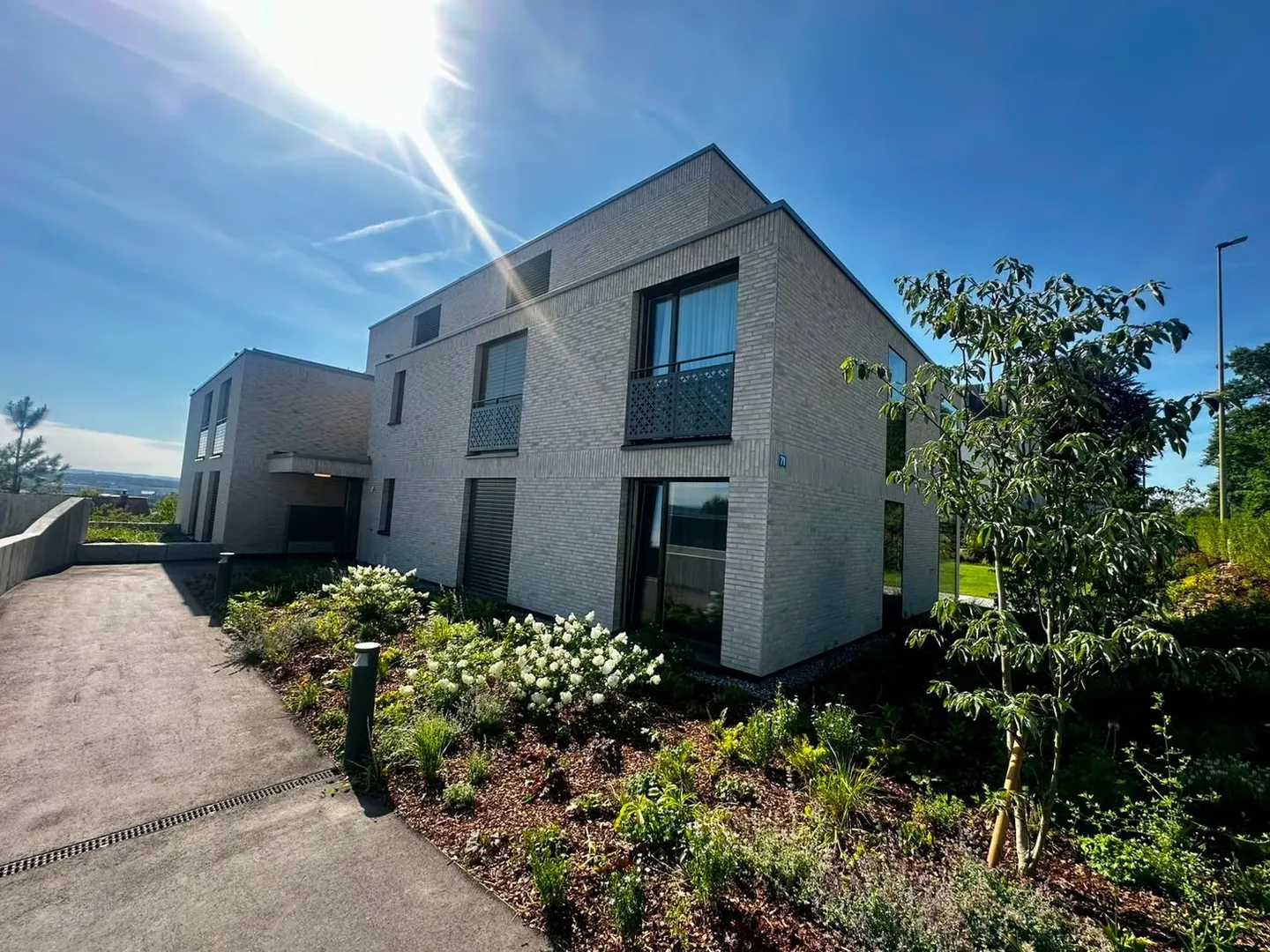 Appartement moderne de 3,5 pièces à Rümlang – nouveau bâtiment élégant avec un grand confort de vie - Photo 1 sur 8