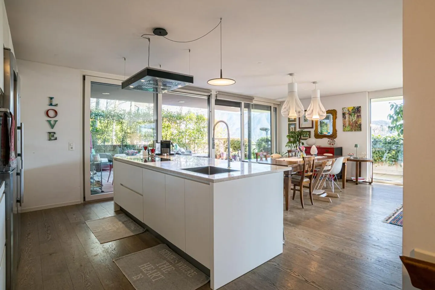 VACALLO – GERÄUMIGE ERDGESCHOSSWOHNUNG MIT GARTEN, ENTSTANDEN AUS DER VEREINIGUNG ZWEIER WOHNUNGEN - Foto 1 von 14