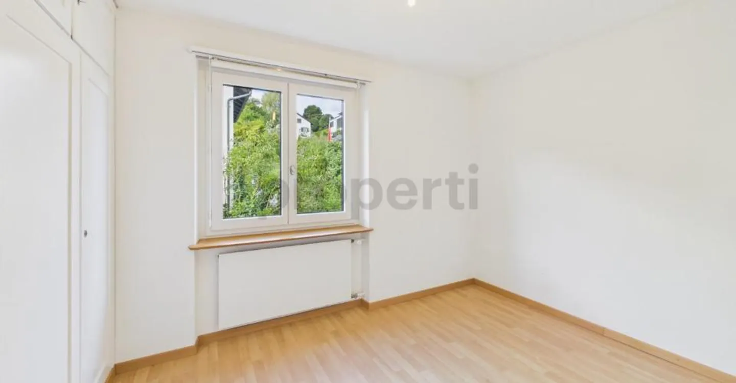 Charmantes Zweifamilienhaus mit Gartenparadies und viel Potenzial in Horgen! - Foto 11 von 12