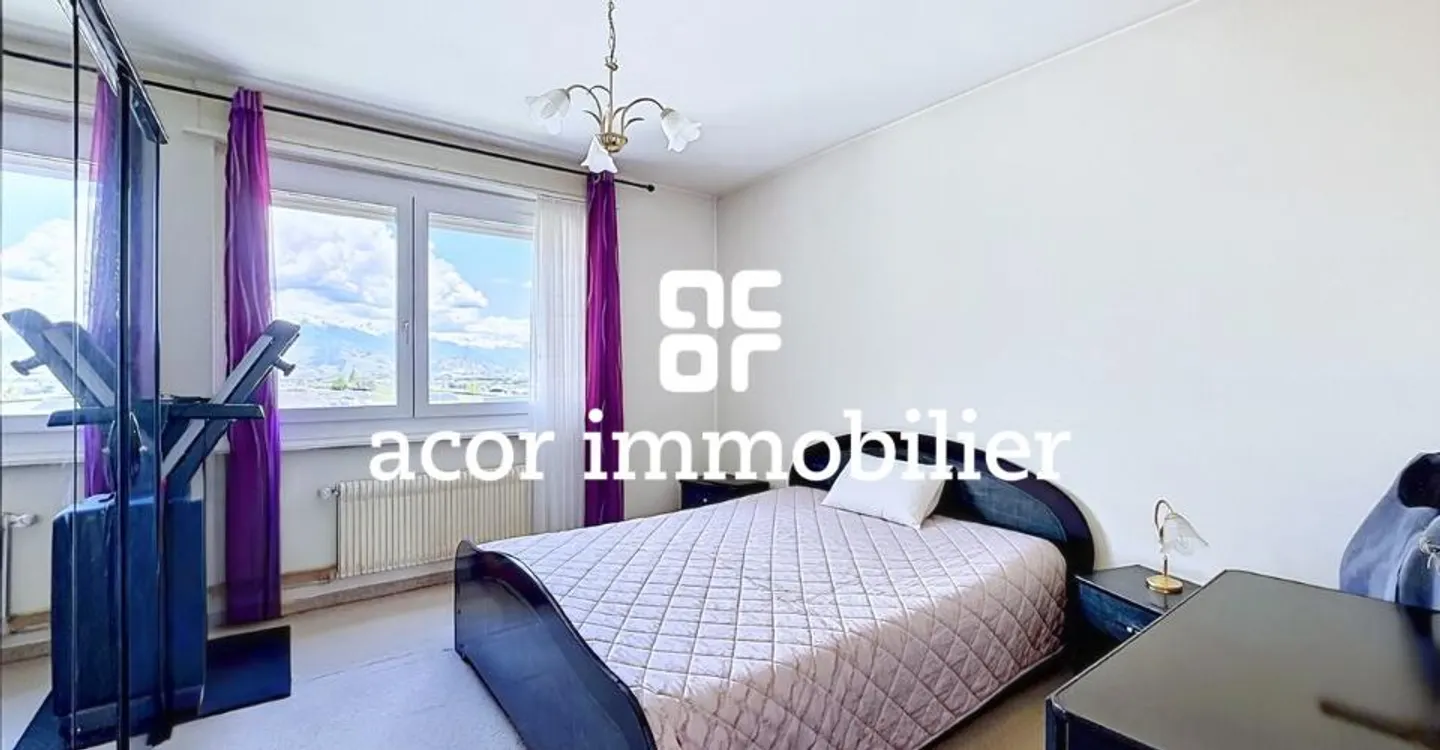 Appartement Charmant avec Balcons - Photo 3 sur 5