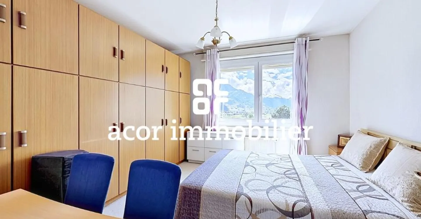Appartement Charmant avec Balcons - Photo 4 sur 5