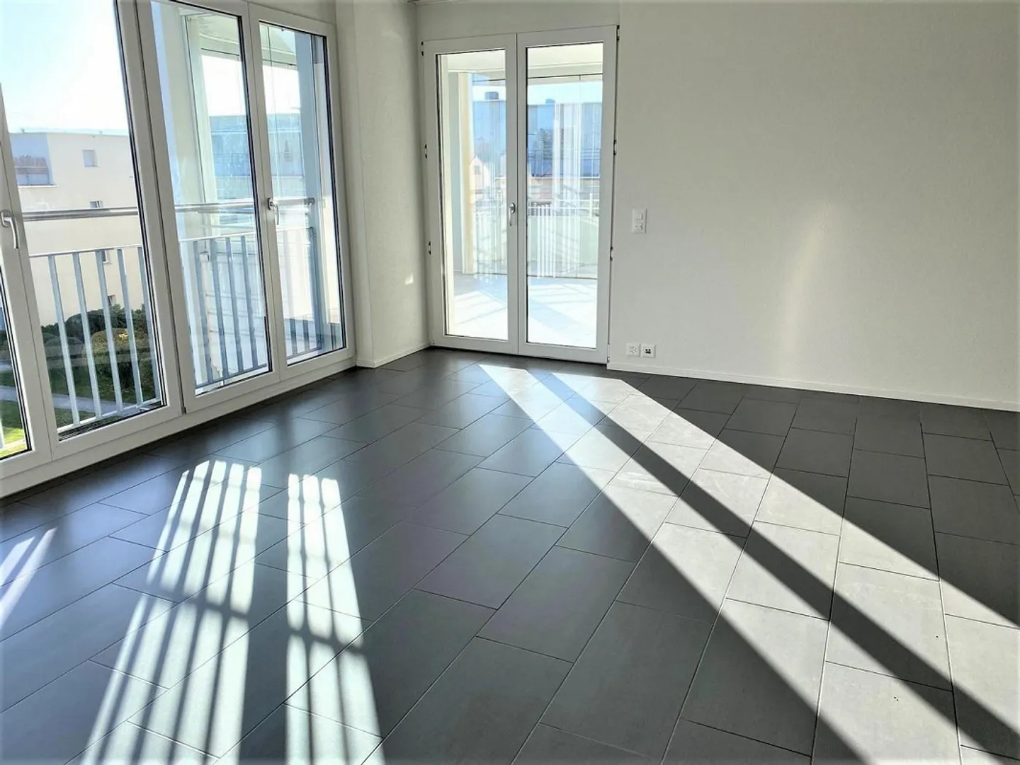 Appartement familial spacieux avec balcon partiellement vitré de 24m2 - Photo 6 sur 13