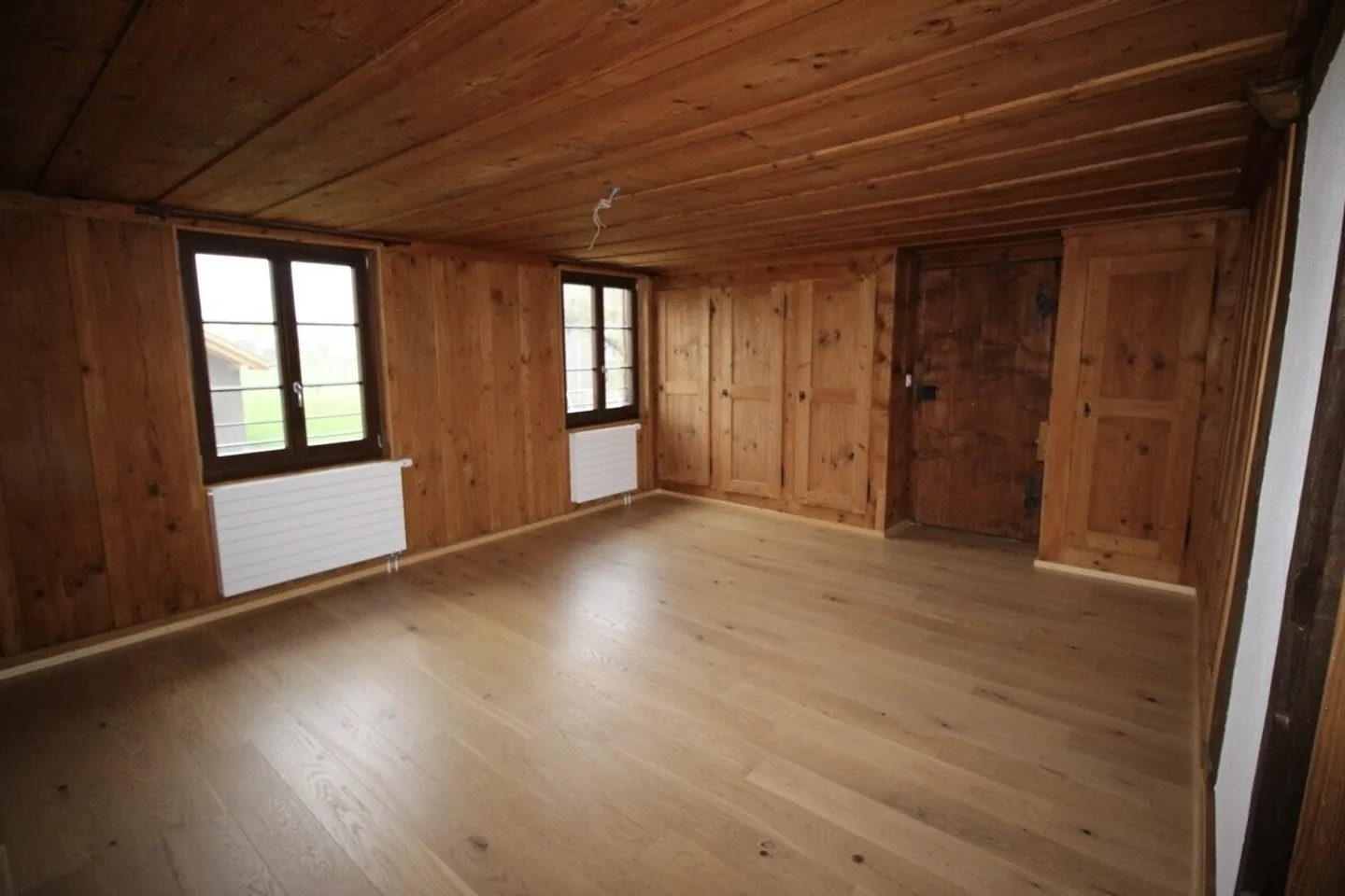 SUPERB AND SPACIOUS 2.5 ROOMS IN A RENOVATED FARM - Photo 1 of 13