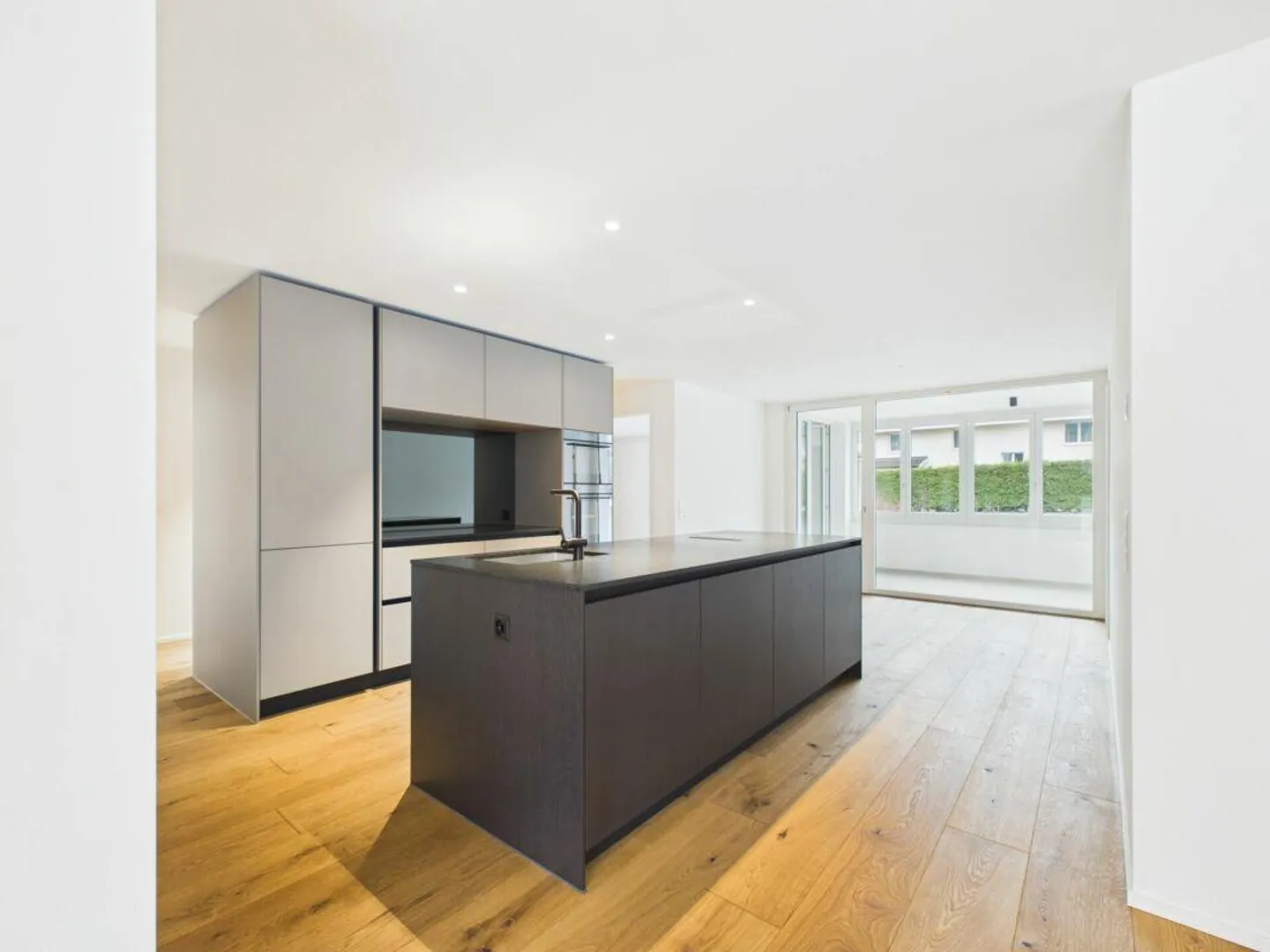 Stilvolle Neubauwohnung mit Garten - Foto 2 von 10